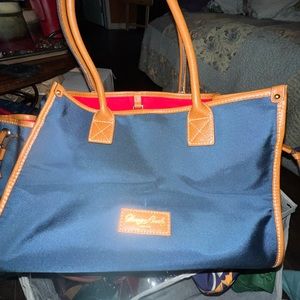 Dooney & Bourke Satchel Purse Blue and Tan with a Red Liner.